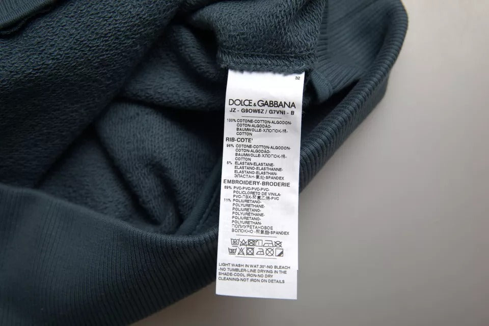 Pull Dolce & Gabbana en coton bleu avec logo, col rond, pour homme, pull-over élégant et confortable.
