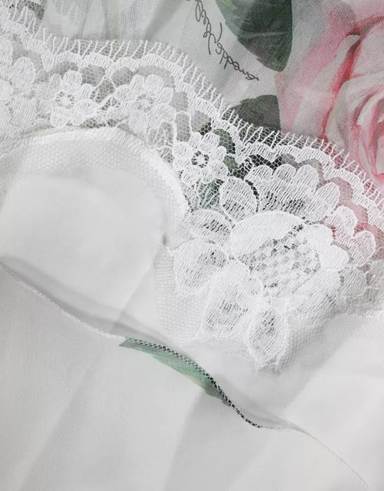 Robe midi en soie blanche Dolce & Gabbana avec imprimé floral, coupe en ligne A, élégante et raffinée.