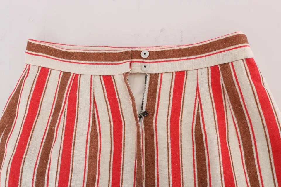 Jupe midi en coton à rayures multicolores Portofino de Dolce & Gabbana, avec motif élégant et coupe fluide.