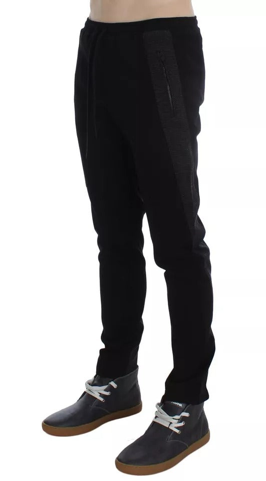 Pantalon décontracté en laine noire et grise Dolce & Gabbana avec rayures, mode élégante et confortable.
