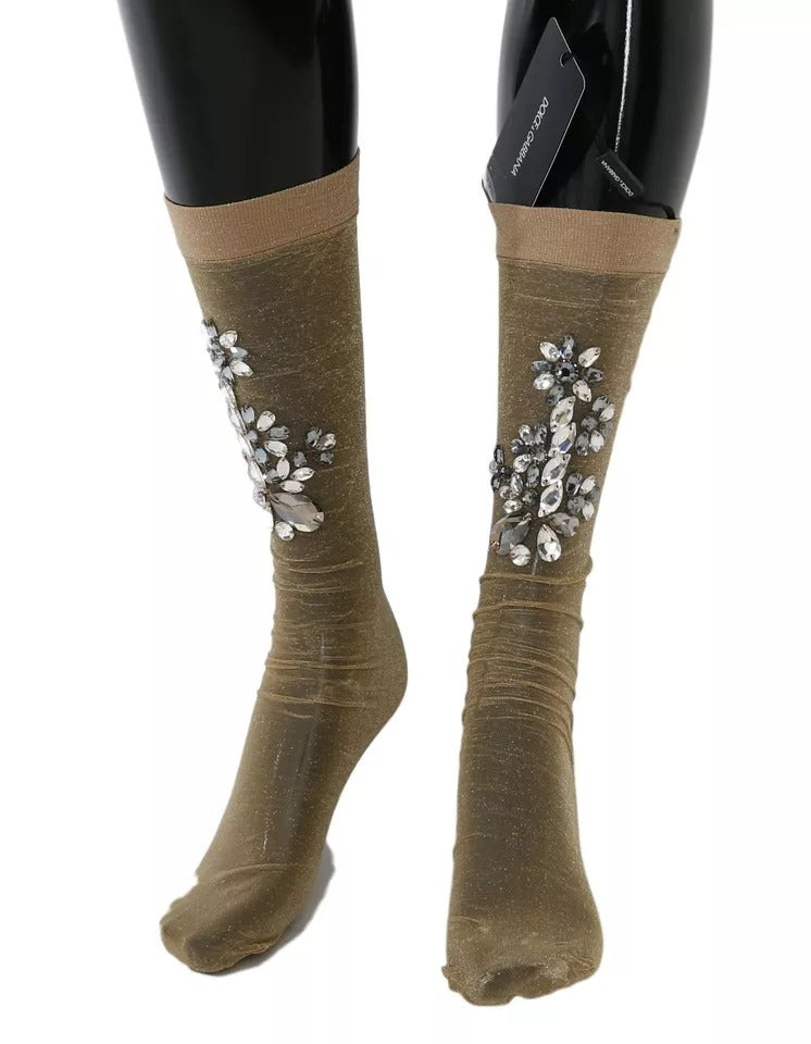 Chaussettes transparantes Dolce & Gabbana avec motif floral doré et cristaux stretch, élégantes et raffinées.