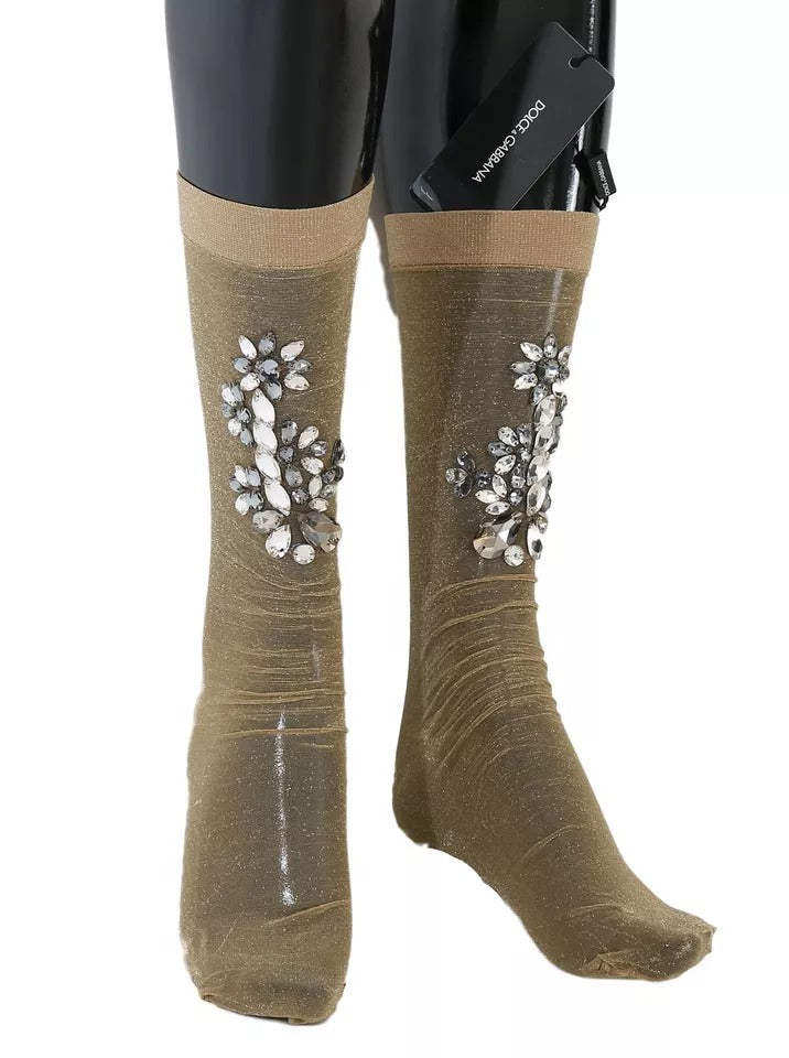 Chaussettes transparentes Dolce & Gabbana or avec motifs floraux et cristaux brillants, extensibles, style élégant et sophistiqué.