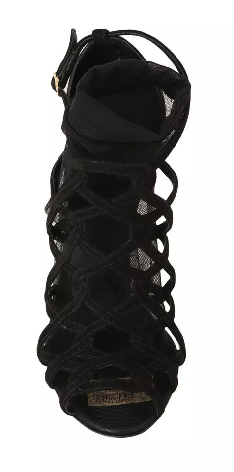 Bottines en daim noir Dolce & Gabbana avec talons stilettos, chaussettes intégrées et design élégant.