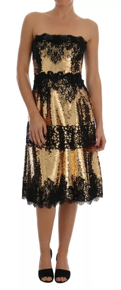 Robe bustier dorée Dolce & Gabbana avec sequins, dentelle ornée et détails brillants pour une allure élégante.