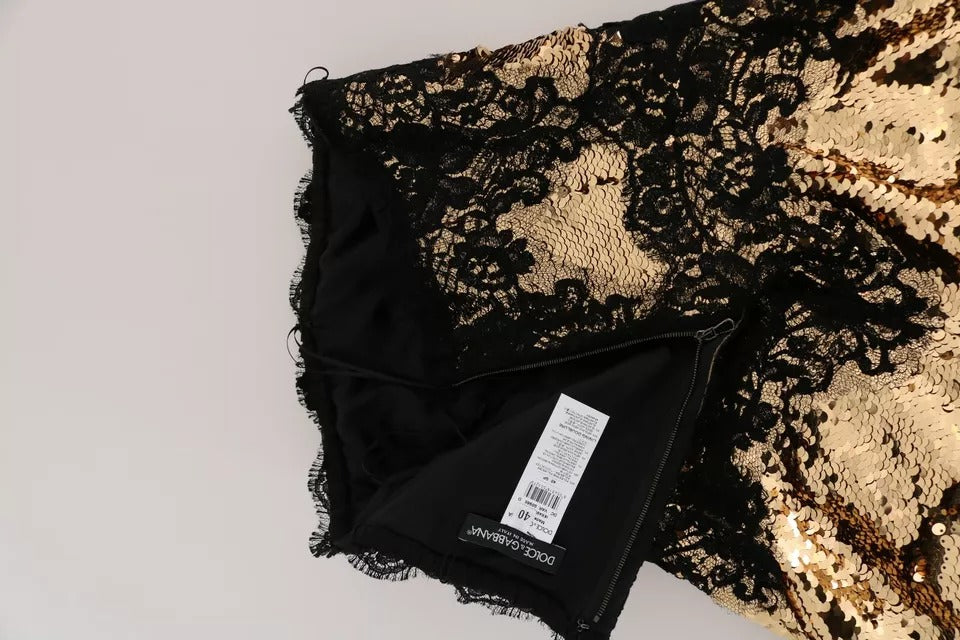 Robe bustier en dentelle orné de sequins et de strass, de la marque Dolce & Gabbana, vue de face.