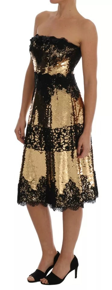 Robe bustier Dolce & Gabbana en dentelle avec sequins dorés et épaules nues, élégante et ornée de broderies brillantes.