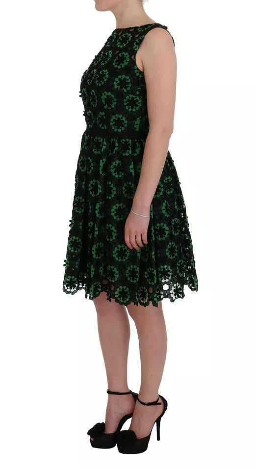 Robe trapèze verte Dolce & Gabbana à motifs floraux et broderie, style élégant et féminin.