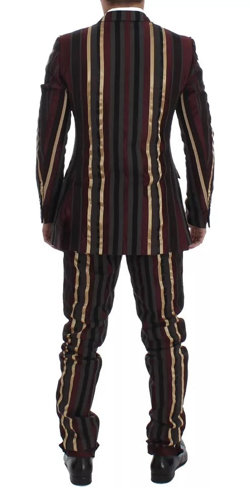 Veste costume Dolce & Gabbana à rayures multicolores, costume slim fit en trois pièces pour défilé de mode.