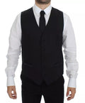 Gilet veste en laine et soie noire Dolce & Gabbana, vêtement élégant avec coupe ajustée et détails raffinés.