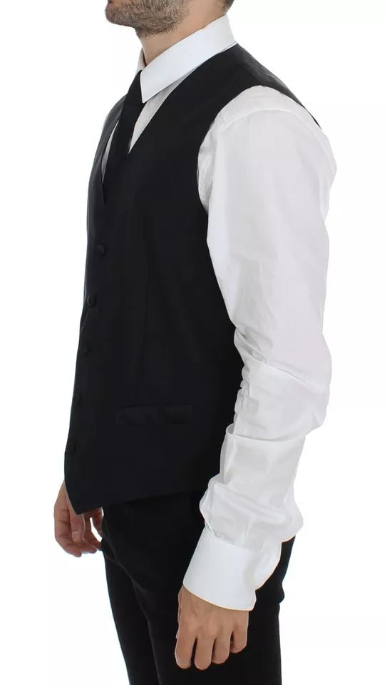 Gilet Dolce & Gabbana en laine et soie noire, veste élégante avec détails sophistiqués, porté sur un mannequin.