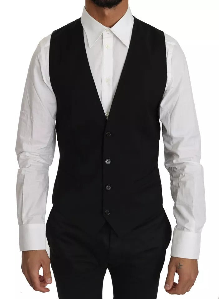 Gilet noir en laine Dolce & Gabbana avec logo, coupe ajustée, porté sur un fond neutre.