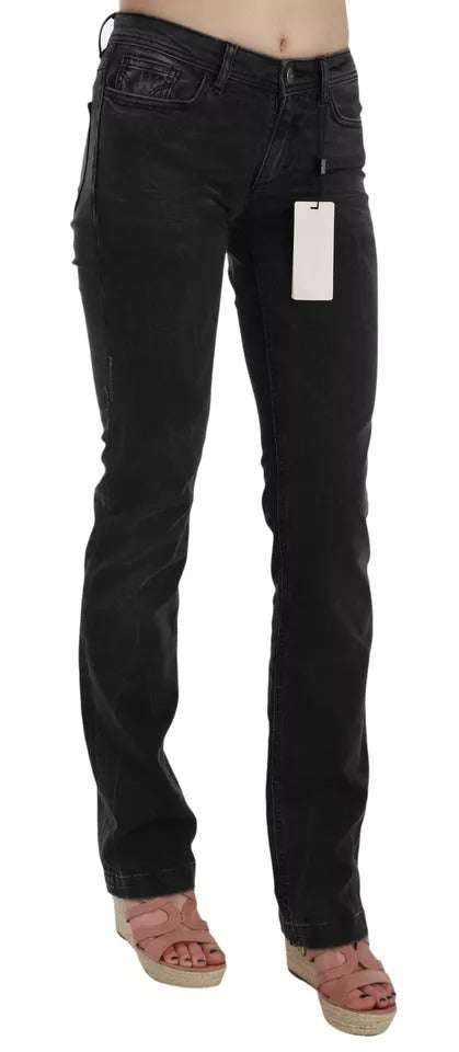 Jeans slim en coton noir de Dolce & Gabbana, pantalon élégant avec coupe ajustée et détails modernes.
