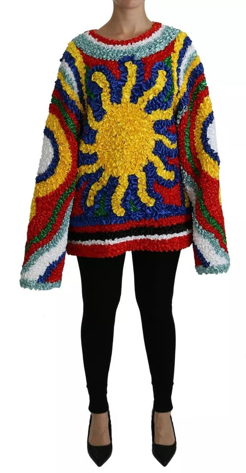 Pull à manches longues Dolce & Gabbana multicolore avec volants, style top enroulé, tissu léger et détails colorés.