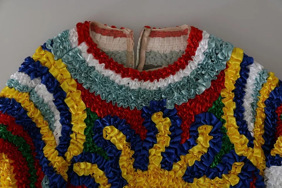 Pull à col rond Dolce & Gabbana multicolore avec volants, style blouse ou sweat-shirt, en tissu léger et coloré.