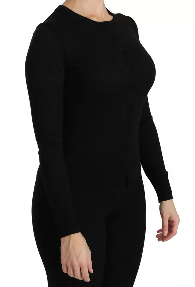Haut à manches longues en laine vierge noire Dolce & Gabbana, blouse élégante avec détail de couture visible.