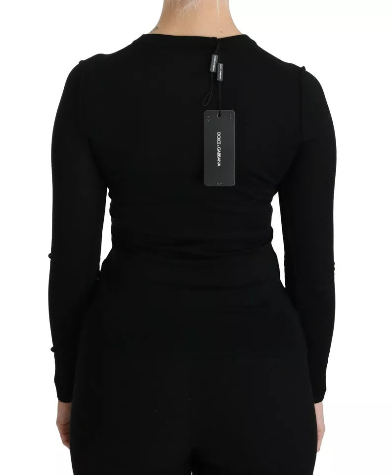 Haut à manches longues en laine vierge noire de Dolce & Gabbana, blouse élégante avec coupe fluide et détails sophistiqués.