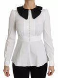 Boutons décoratifs noirs et blancs sur une chemise ou blouse Dolce & Gabbana, détails élégants visibles sur l'image.