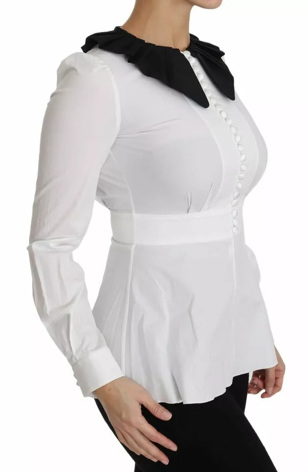 Boutons décoratifs noirs et blancs sur une chemise Dolce & Gabbana, blouse élégante avec détails raffinés.