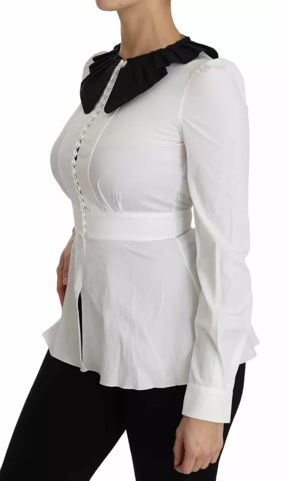 Boutons décoratifs noirs et blancs pour chemise ou blouse Dolce & Gabbana, détails élégants sur le haut ou la chemise.