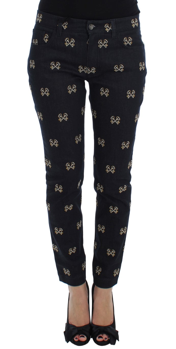Jean slim Dolce & Gabbana KATE bleu avec broderies clés, coupe ajustée et détails élégants visibles sur l'image.