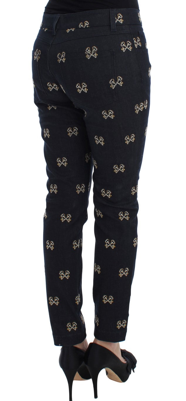 Jeans slim bleu Dolce & Gabbana KATE avec broderies à la clé, coupe ajustée et détails élégants.