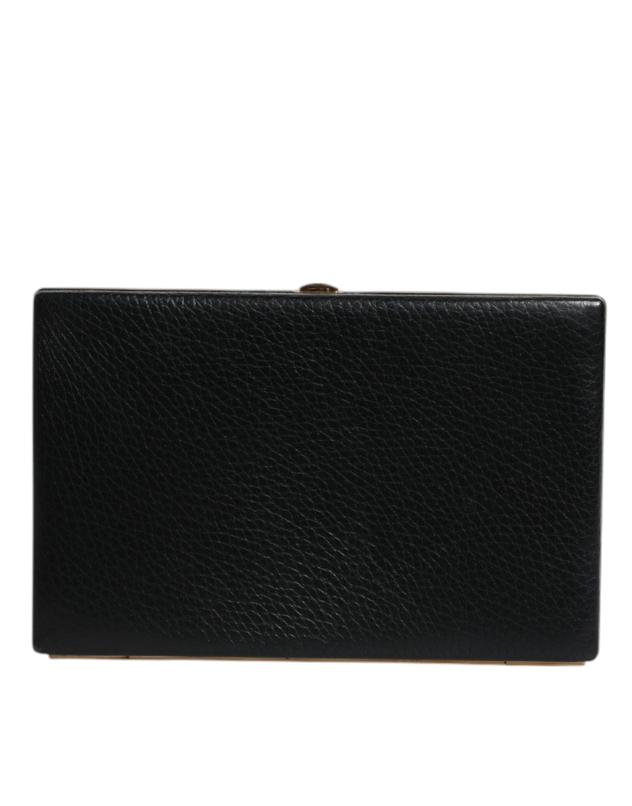 Sac pochette Dolce & Gabbana en cuir noir avec cadre doré, parfait pour soirée ou événement élégant.