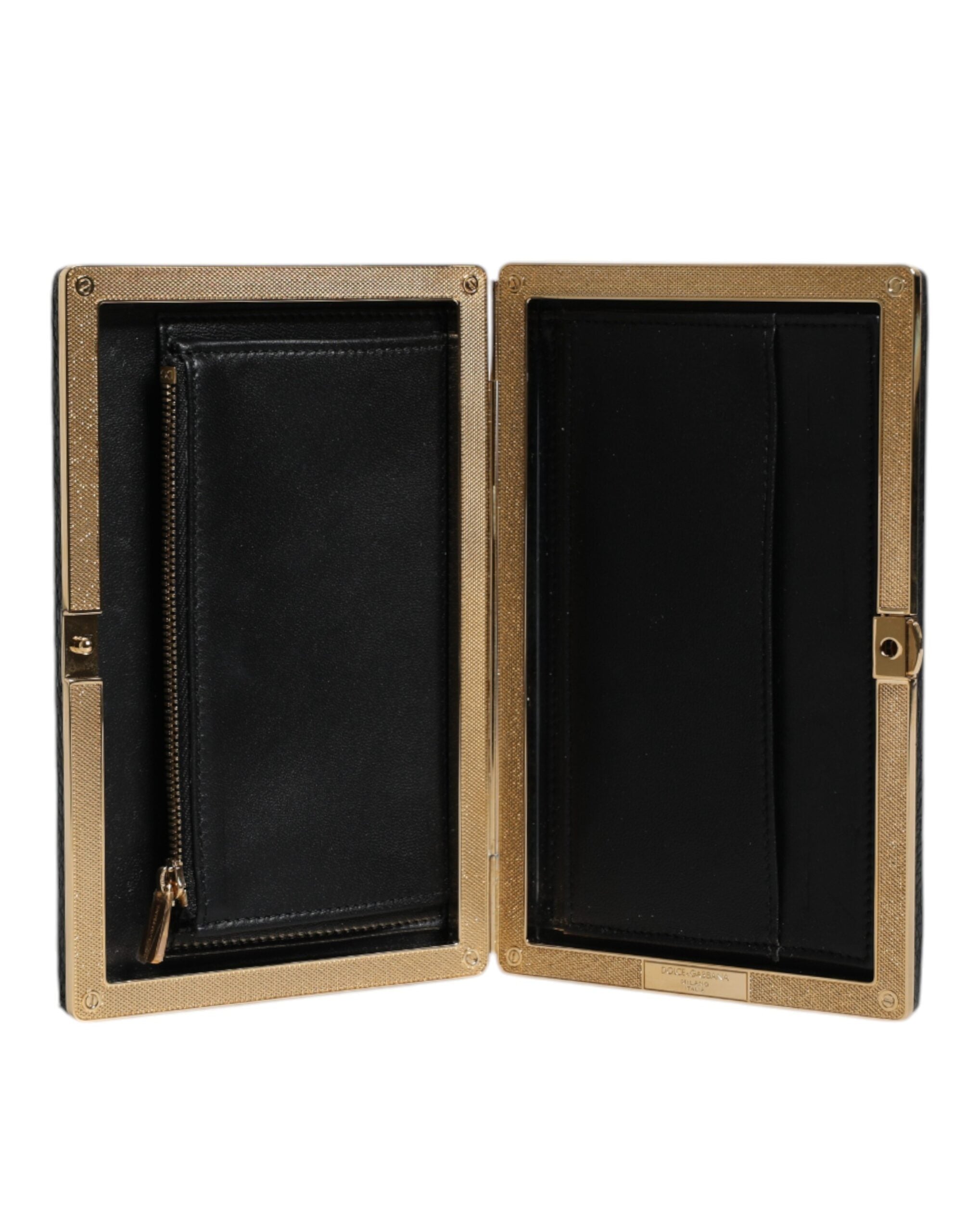 Sac pochette en cuir noir Dolce & Gabbana avec cadre doré, parfait pour soirée et occasions spéciales.
