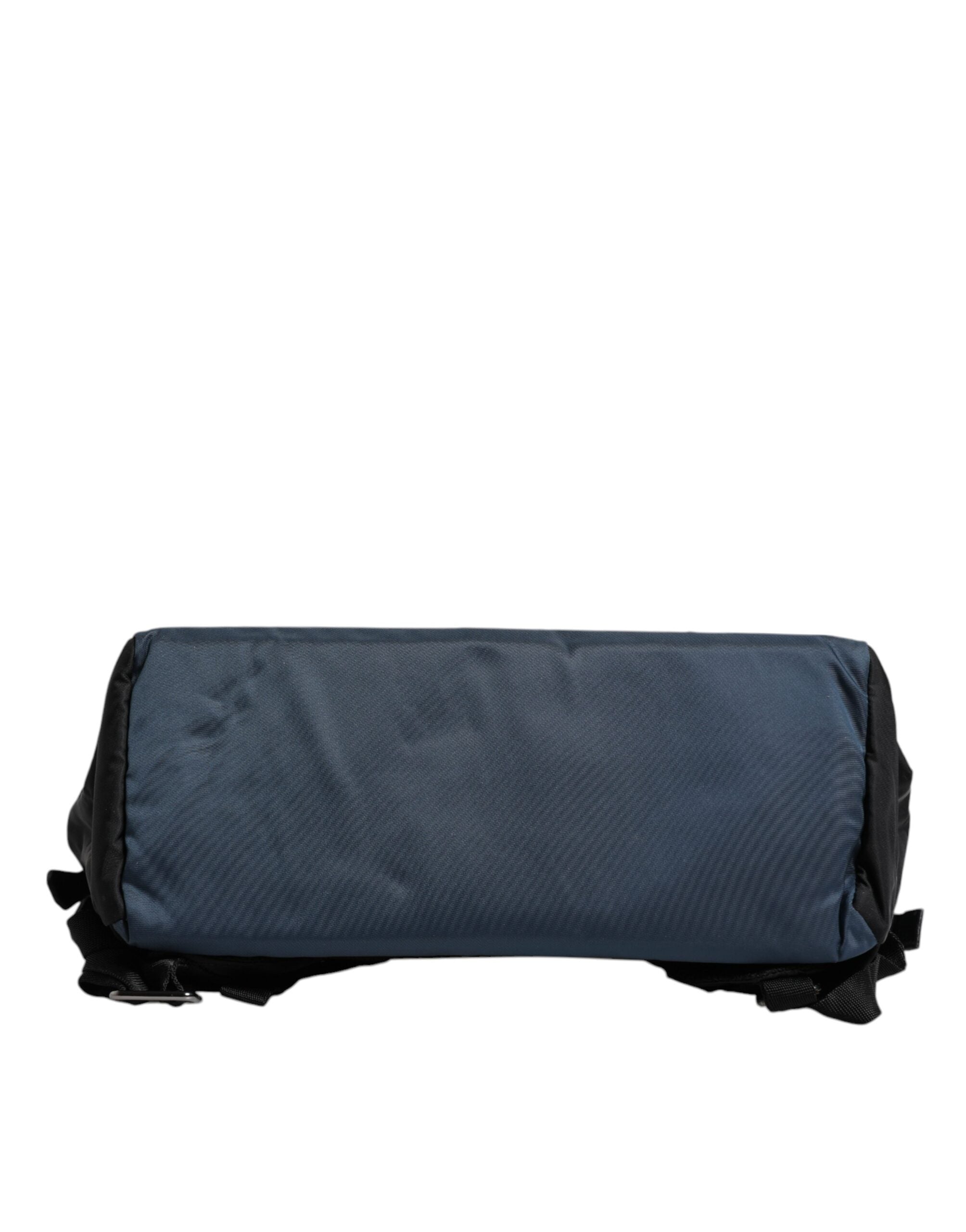 Sac à dos noir en nylon Dolce & Gabbana avec logo DG, style scolaire et design élégant, visible sur l'image.