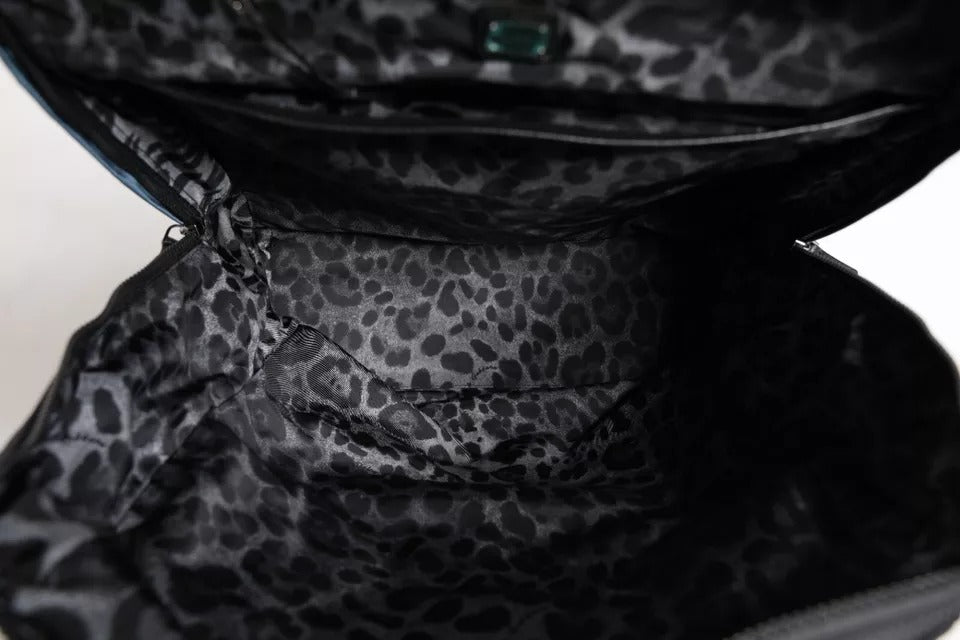 Sac à dos Dolce & Gabbana en nylon noir avec logo DG, style scolaire et pratique, visible avec plusieurs compartiments.