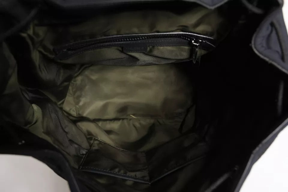 Sac à dos Dolce & Gabbana noir en néoprène et nylon avec logo DG visible, style scolaire et moderne.