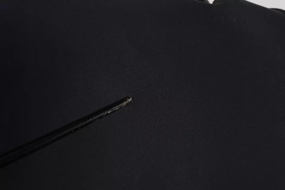 Sac à dos Dolce & Gabbana en néoprène noir avec logo DG, style scolaire, design moderne et élégant.