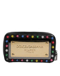 Sac clutch noir en cuir Dolce & Gabbana avec logo LED, bandoulière en bracelet, design élégant et moderne.