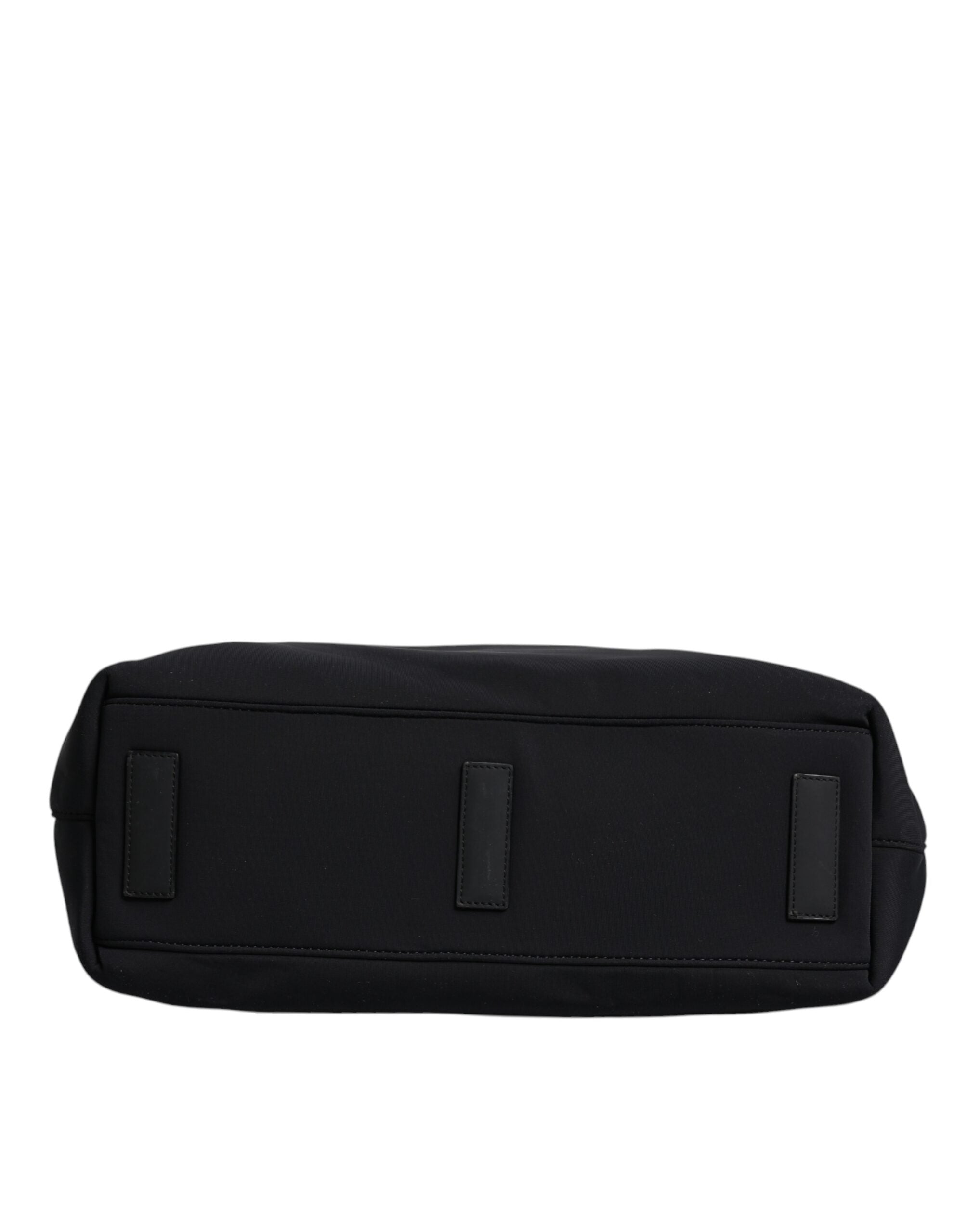 Sac à main tote noir en toile Dolce & Gabbana avec logo DG pour femmes, porté sur l'épaule.