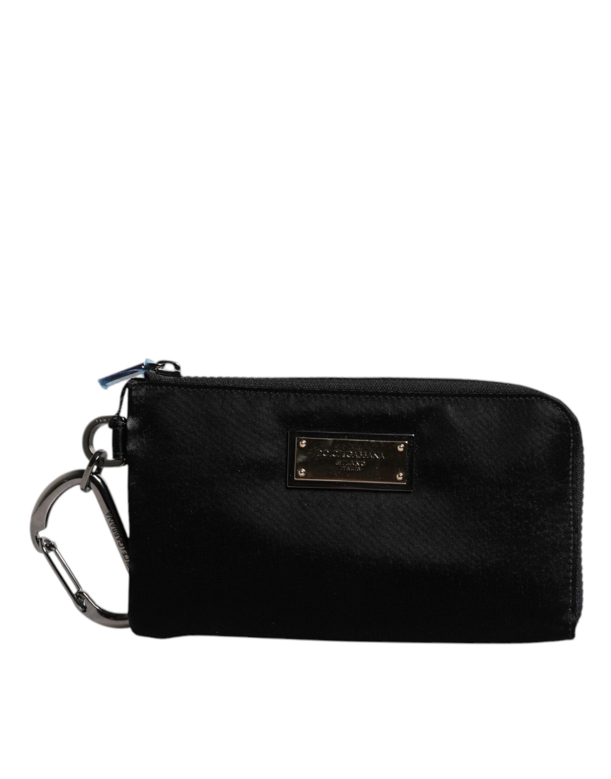 Porte-clés en nylon noir Dolce & Gabbana avec logo en plaque, attaché à une pochette ou clutch élégante.