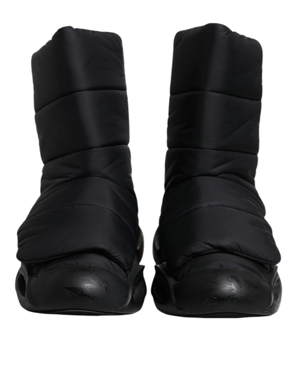 Chaussures Dolce & Gabbana baskets noires à enfiler avec motif ondulé matelassé, style élégant et moderne.