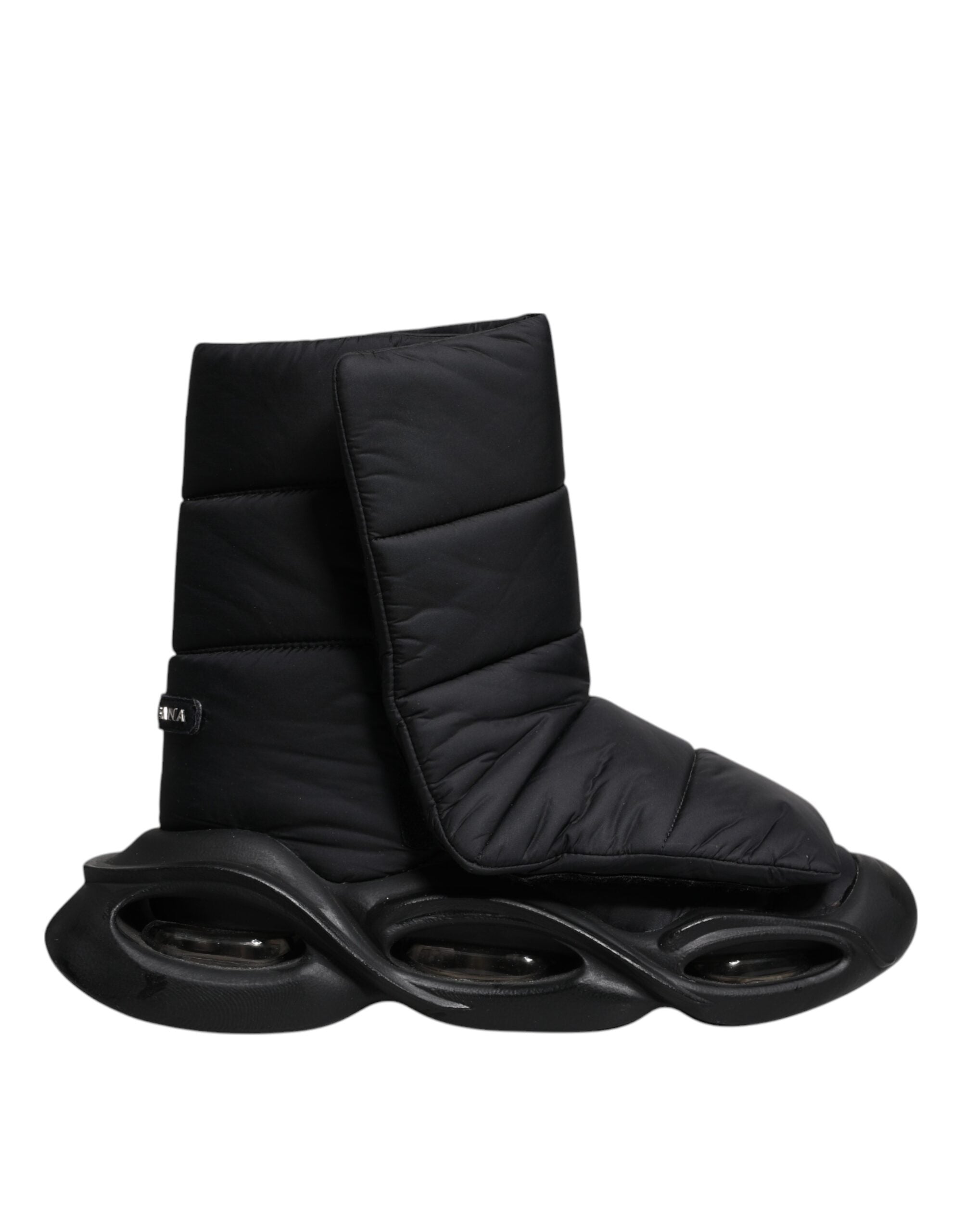 Chaussures sneakers Dolce & Gabbana noires à enfiler avec motif ondulé matelassé, style décontracté et moderne.