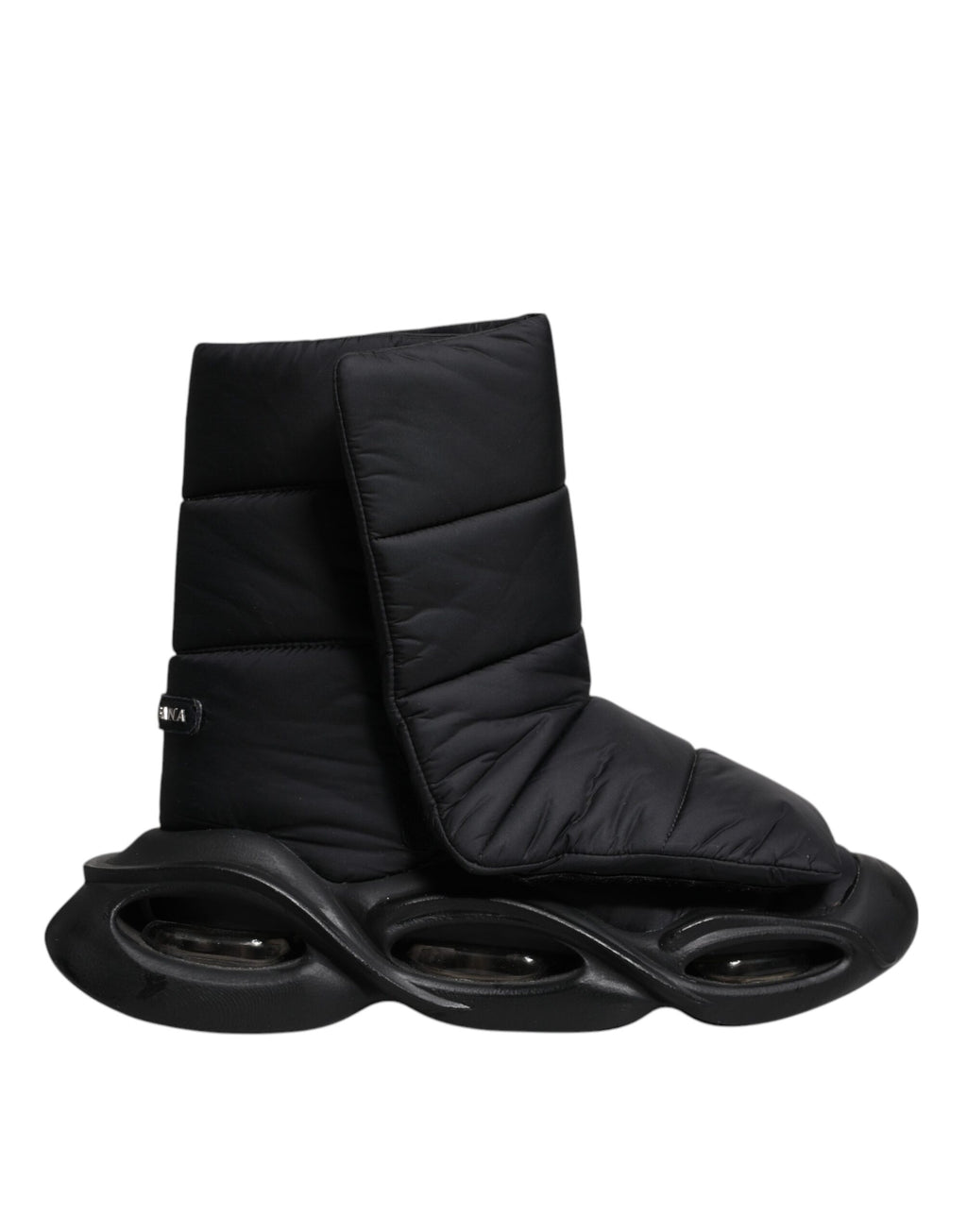 Chaussures sneakers Dolce & Gabbana noires à enfiler avec motif ondulé matelassé, style décontracté et moderne.