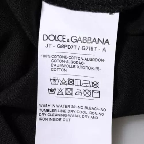 T-shirt noir en coton Dolce & Gabbana avec logo imprimé, col ras du cou, vue de face.