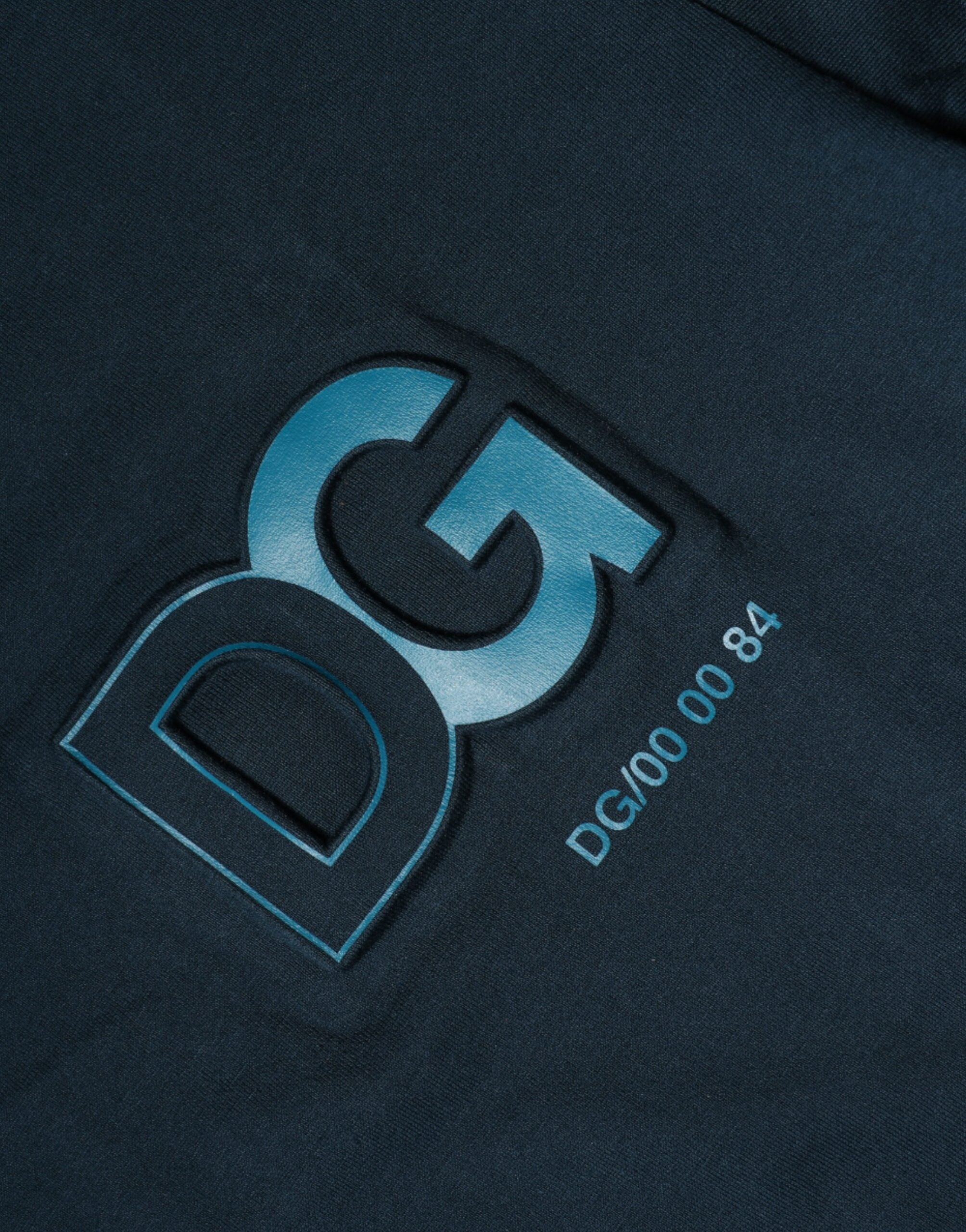 T-shirt Dolce & Gabbana à manches courtes avec logo bleu, col ras du cou, style décontracté, visible en image.