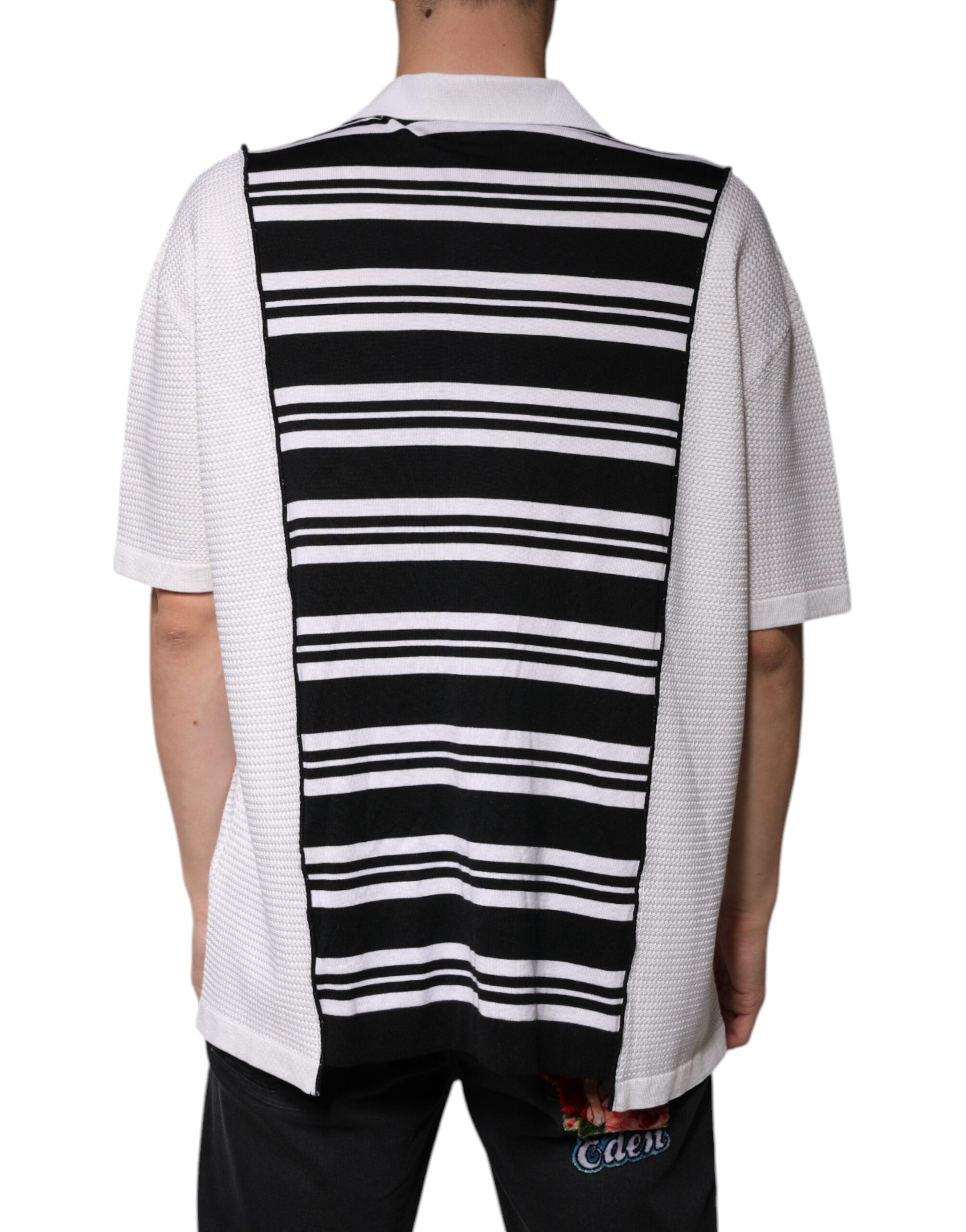 T-shirt polo Dolce & Gabbana à rayures noires et blanches avec col, style élégant et moderne.