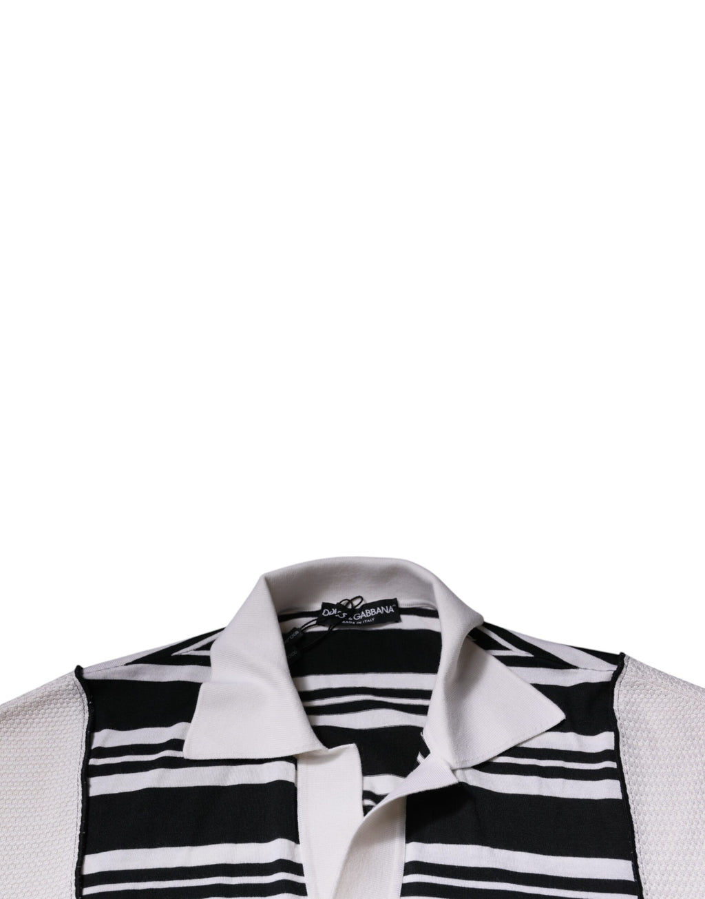 T-shirt polo Dolce & Gabbana à rayures noires et blanches avec col, vue de face sur un fond neutre.