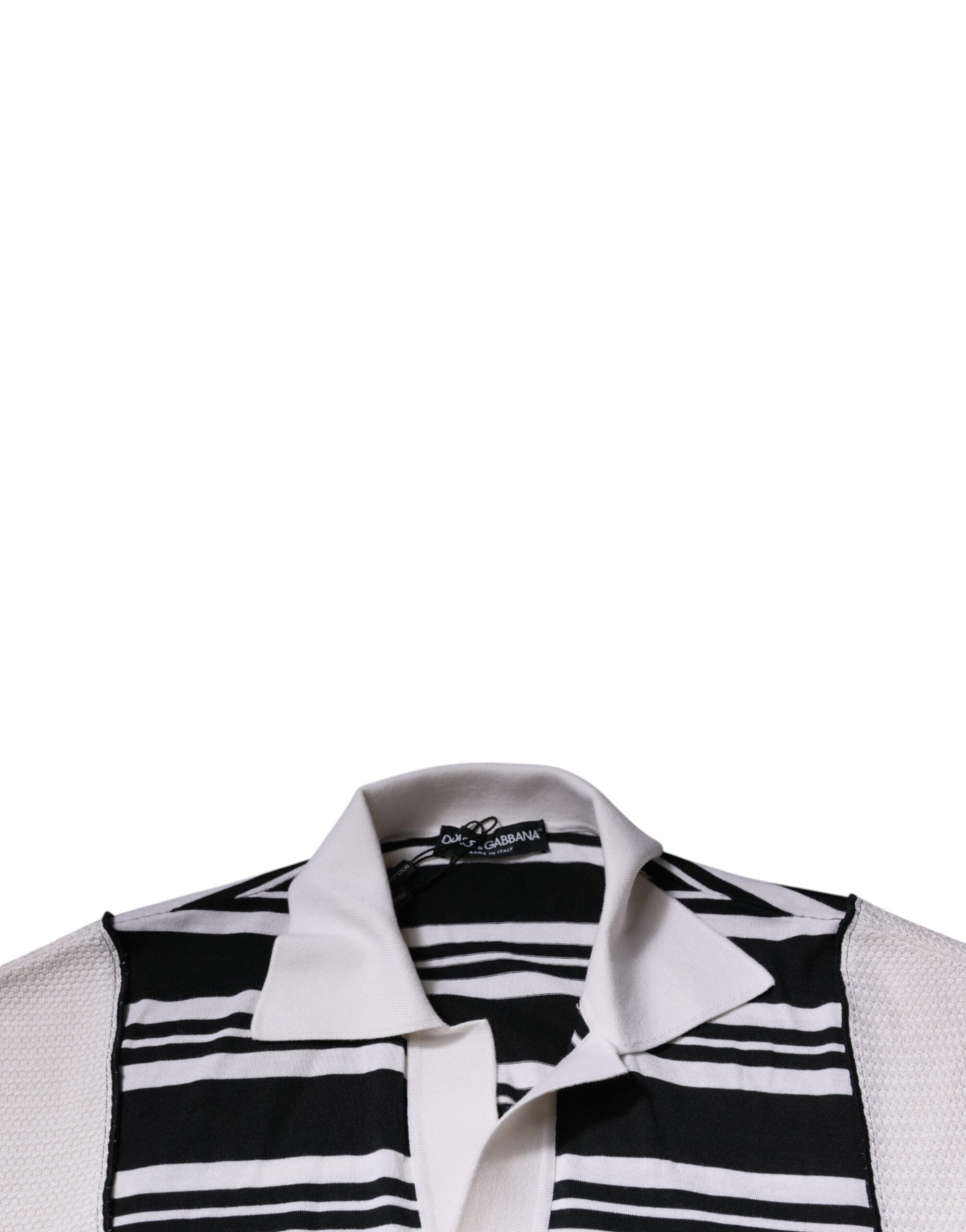 T-shirt polo Dolce & Gabbana à rayures noires et blanches avec col, vue de face sur un fond neutre.
