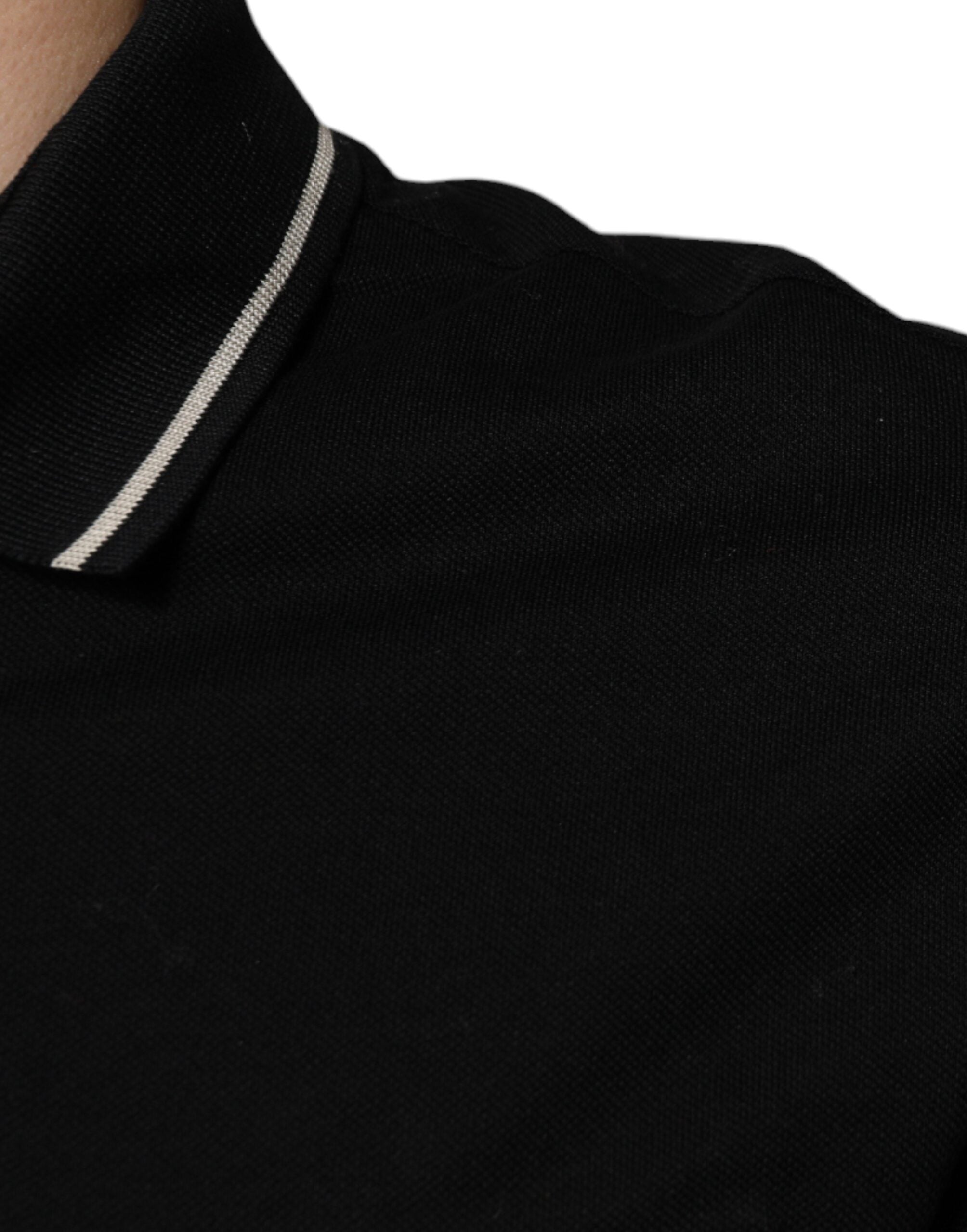 Polo Dolce & Gabbana en coton noir et blanc à manches courtes, style élégant et classique, vue de face.