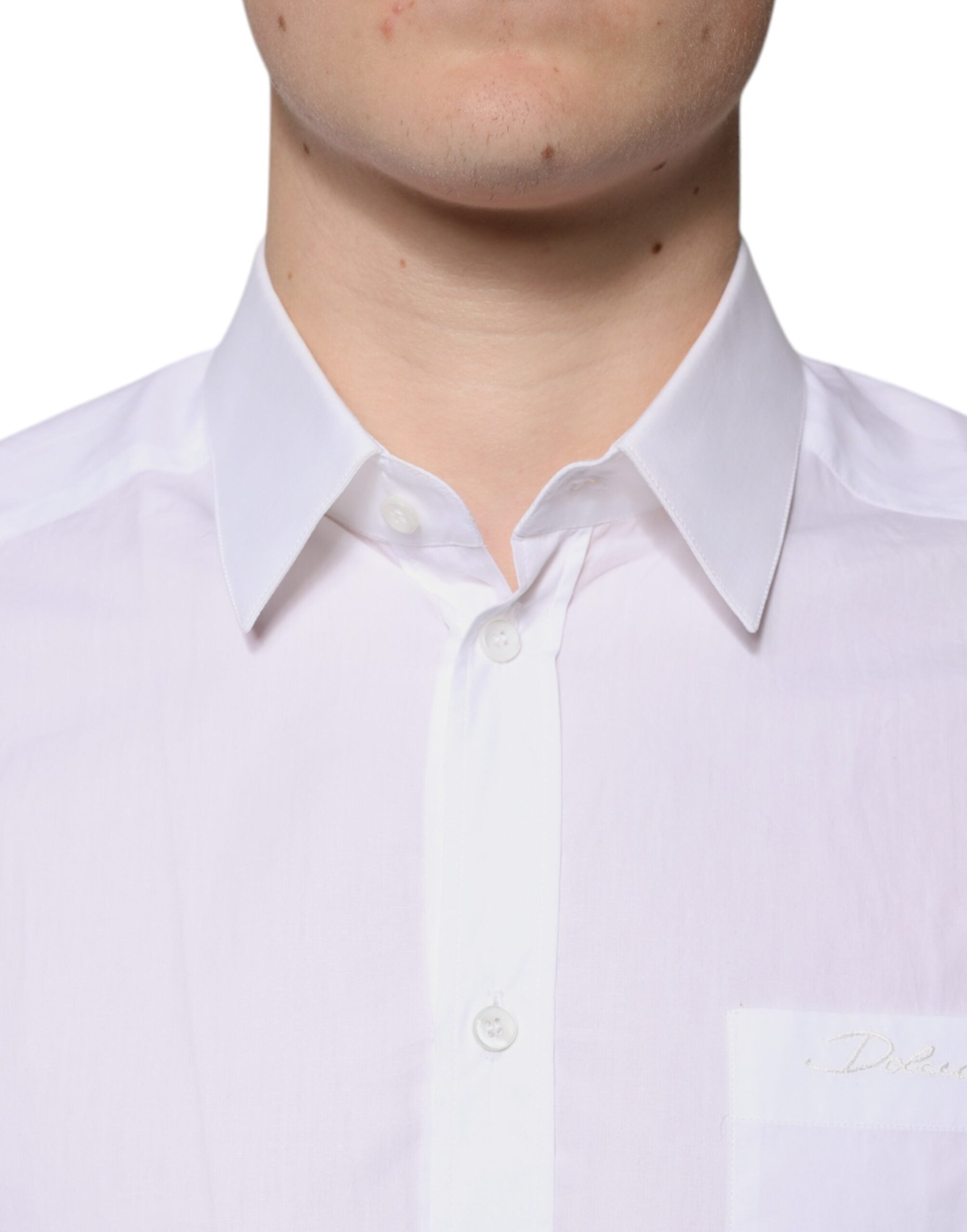 Chemise blanche en coton à manches longues Dolce & Gabbana avec détails dorés, élégante chemise de marque de luxe.
