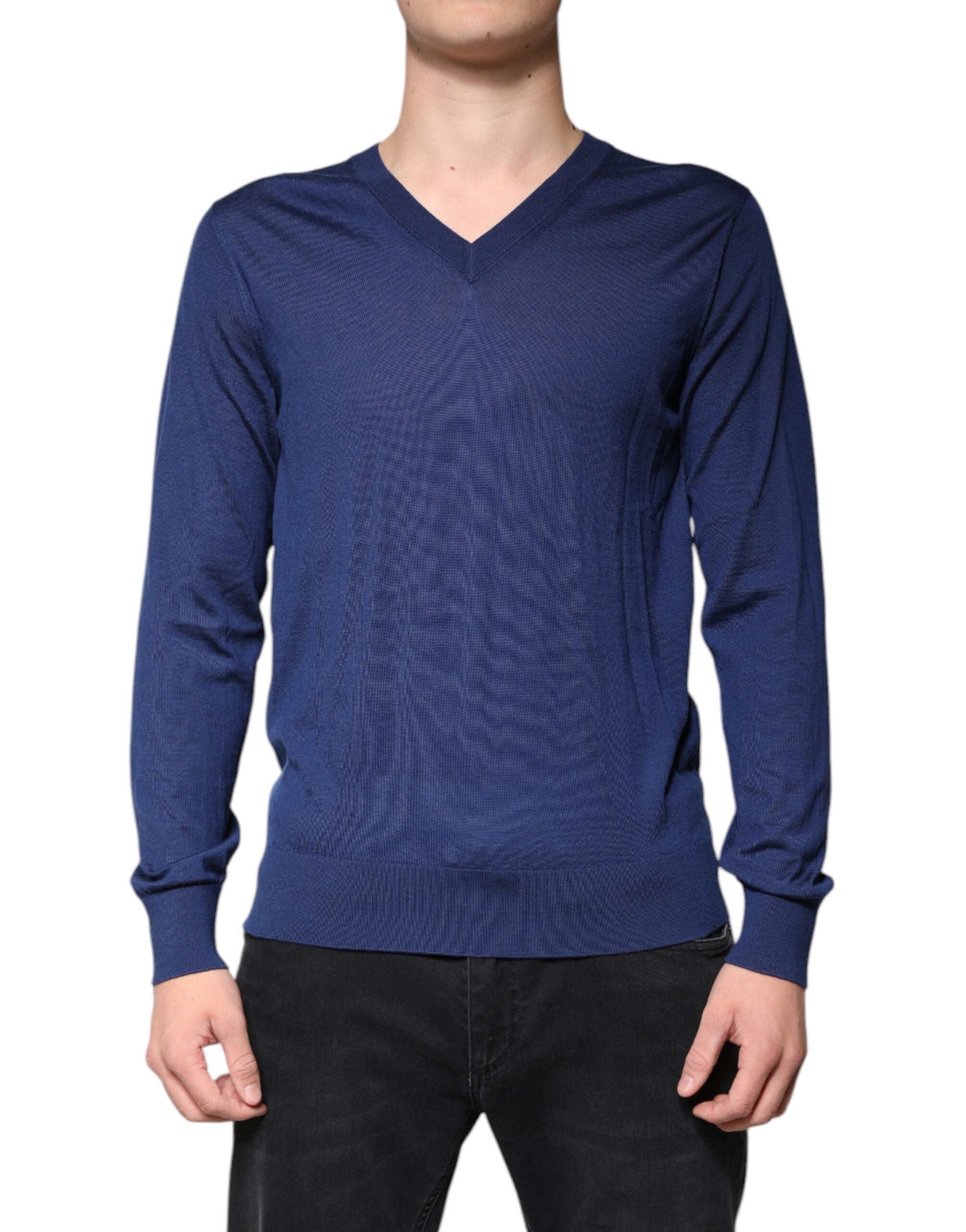 Pull en cachemire bleu navy Dolce & Gabbana à col en V, vue de face, avec détails de texture.