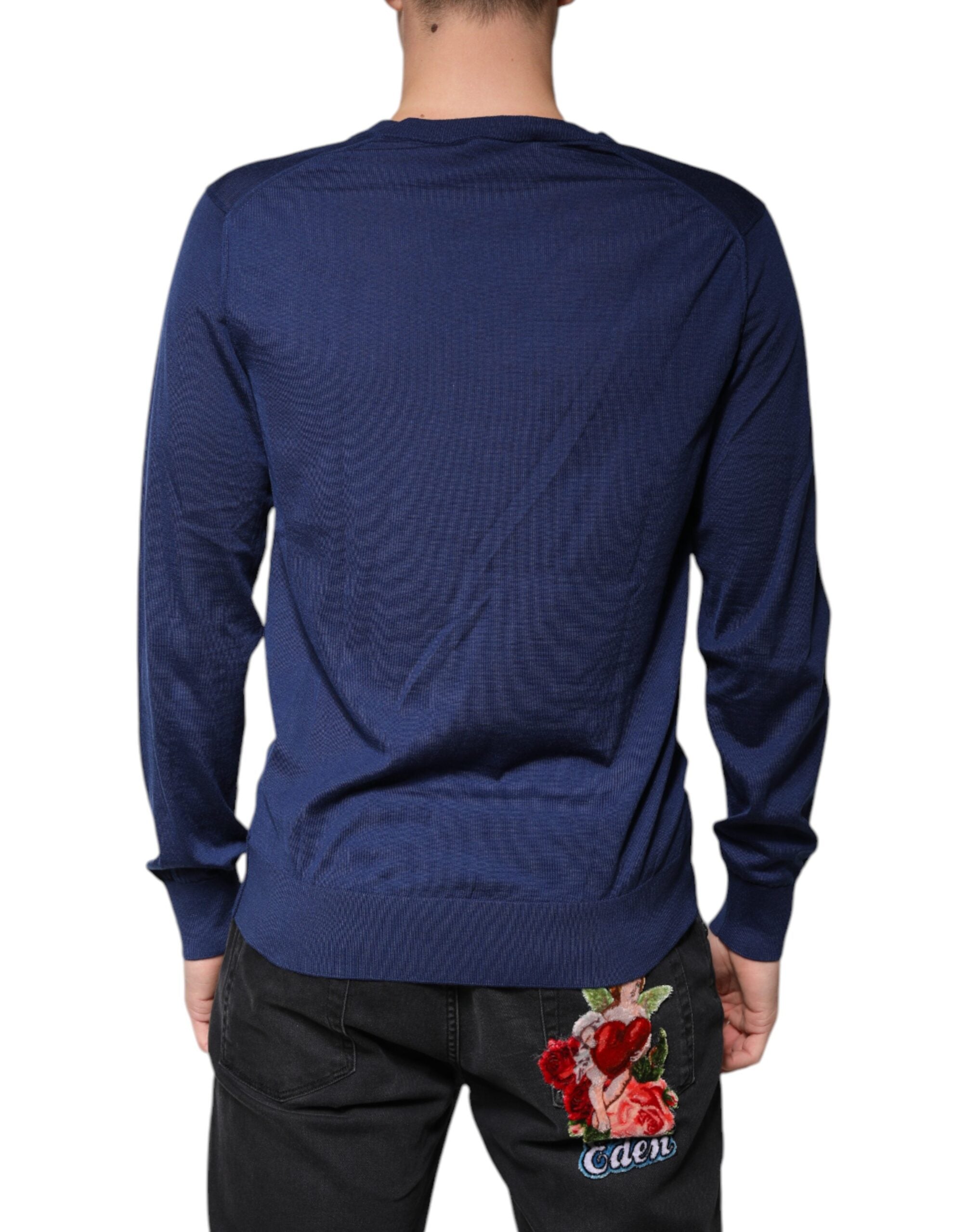 Pull en cachemire bleu marine Dolce & Gabbana, col en V, doux et élégant, idéal pour un style chic et confortable.