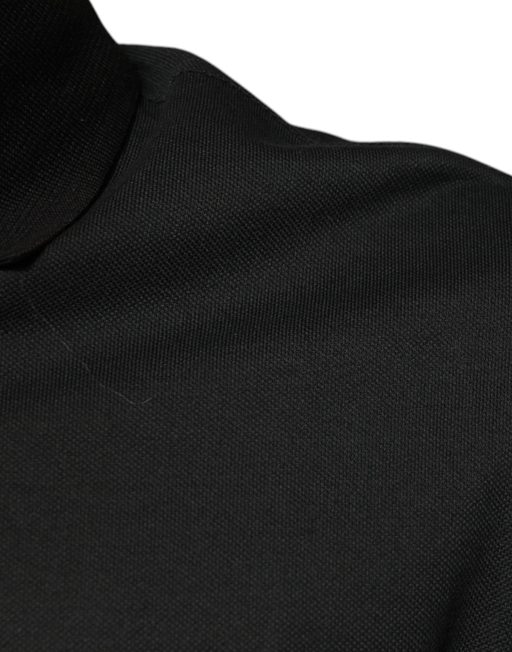 Polo en coton noir Dolce & Gabbana avec logo imprimé, col classique, vue de face.