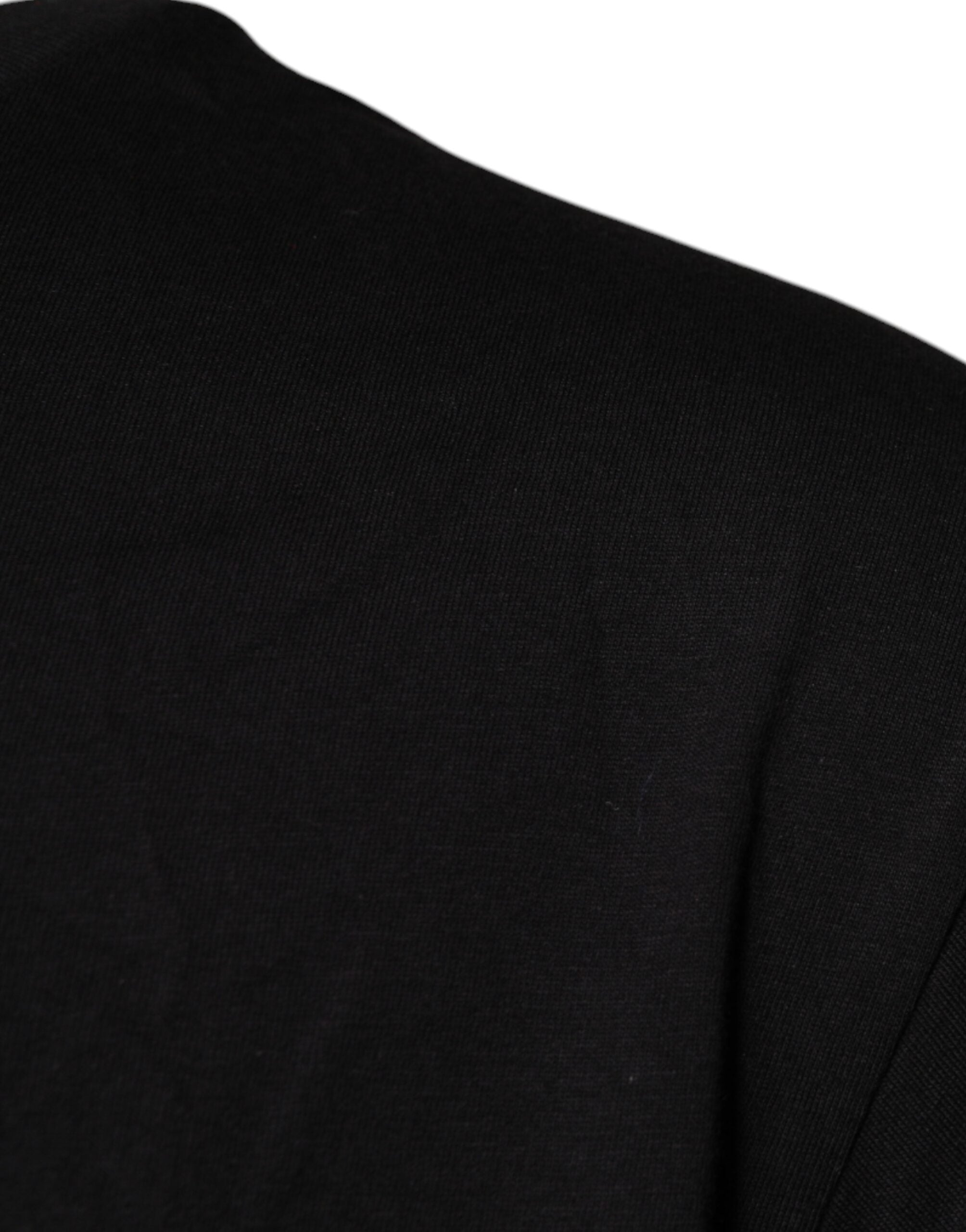 T-shirt en coton noir Dolce & Gabbana avec logo imprimé, col rond et style décontracté visible sur l'image.