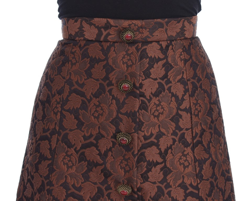 Jupe courte en brocart floral marron Dolce & Gabbana, style mini bubble, avec détails sophistiqués et motifs floraux élégants.