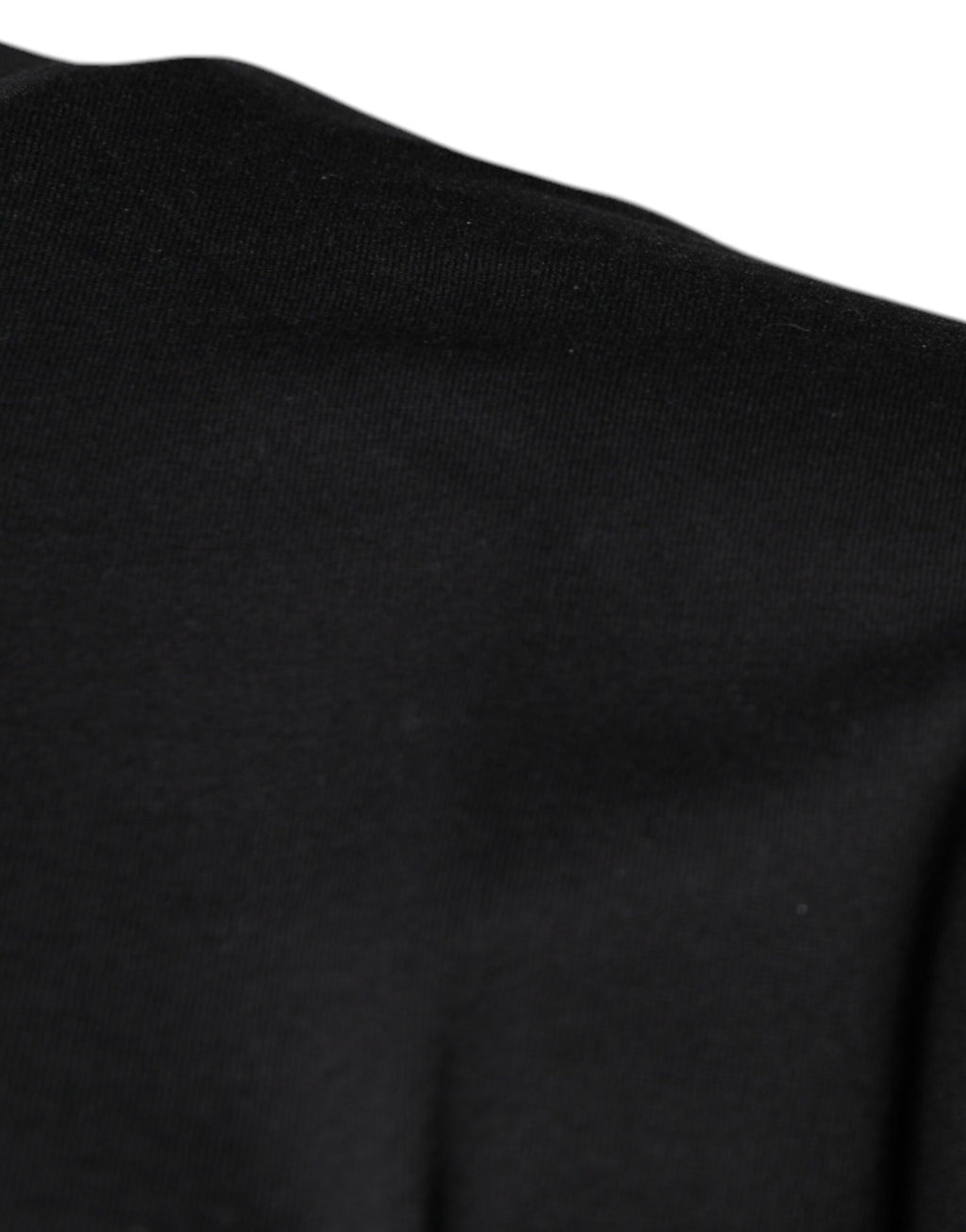 T-shirt en coton noir Dolce & Gabbana avec logo DG imprimé, col rond, style décontracté et moderne.